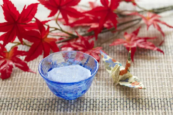 stock image papre crane origami and bowl with water