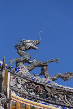 dragon statue on the temple roof, Kirin at the Gate of the Confucius Temple, Nagasaki, Japan clipart