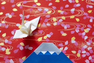 Mt. Fuji and origami crane on floral pattern 