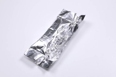 wrapped foil isolated on white background