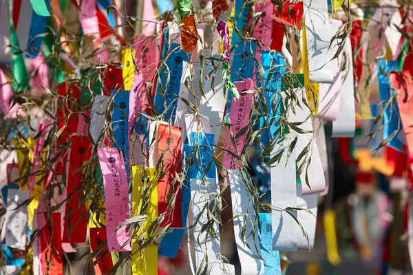 stock image Small pieces of paper with wishes written on Tanzaku