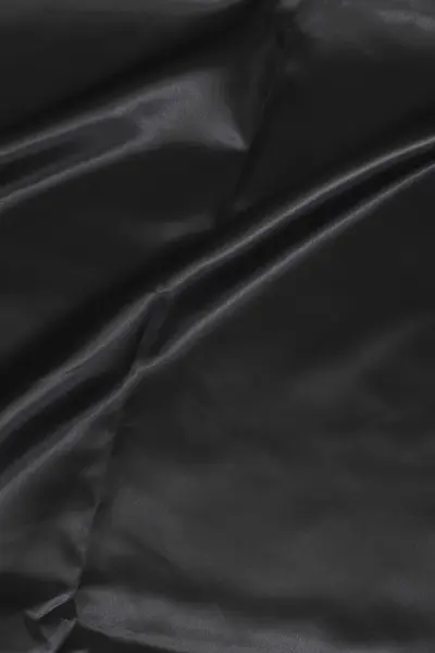 Textura de tela negra, tela ondulada de color negro resbaladizo, textura de  tela de satén de lujo.