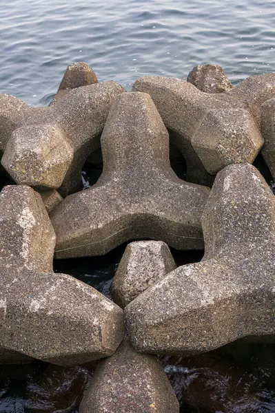 Tetrapoder Havets Strand Vågspridande Betongblock Som Används För Att Förhindra Stockfoto