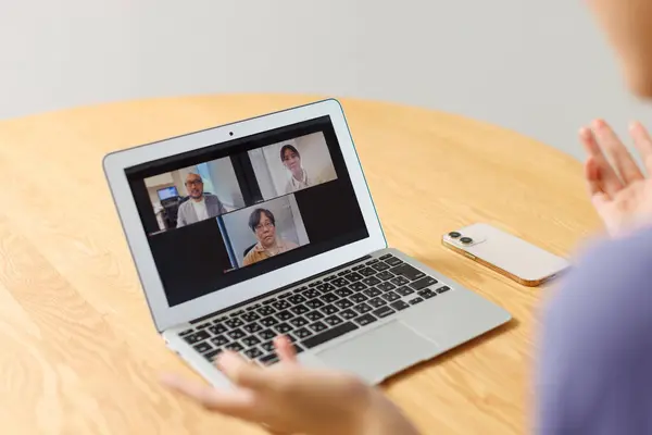 online meeting of business people, woman using laptop