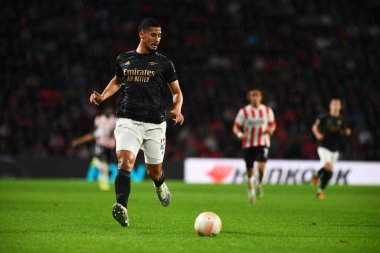 NETHERLANDS, EINDHOVEN - OCTOBER 27, 2022: William Saliba. The match of UEFA Europa League PSV Eindhoven vs Arsenal London clipart