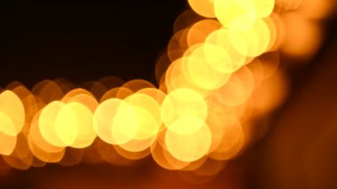 Cool New year lights. An abstract background bokeh circles. Beautiful background with particles.