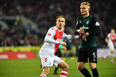 GERMANY, COLOGNE - JANUARY 21, 2023: Mathias Olesen, Amos Pieper. The match of Bundesliga 1.FC Koeln  vs SV Werder Bremen