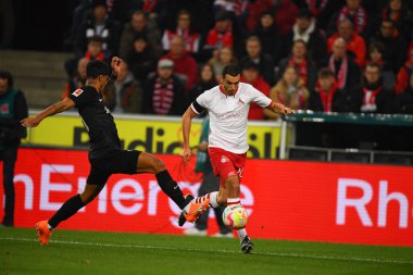 COLOGNE, GERMANY - 12.02.23: Ellyes Skhiri, Tuta. The match of 1. Bundesliga 1. FC Koeln vs Eintracht Frankfurt at Rhein Energie Stadium