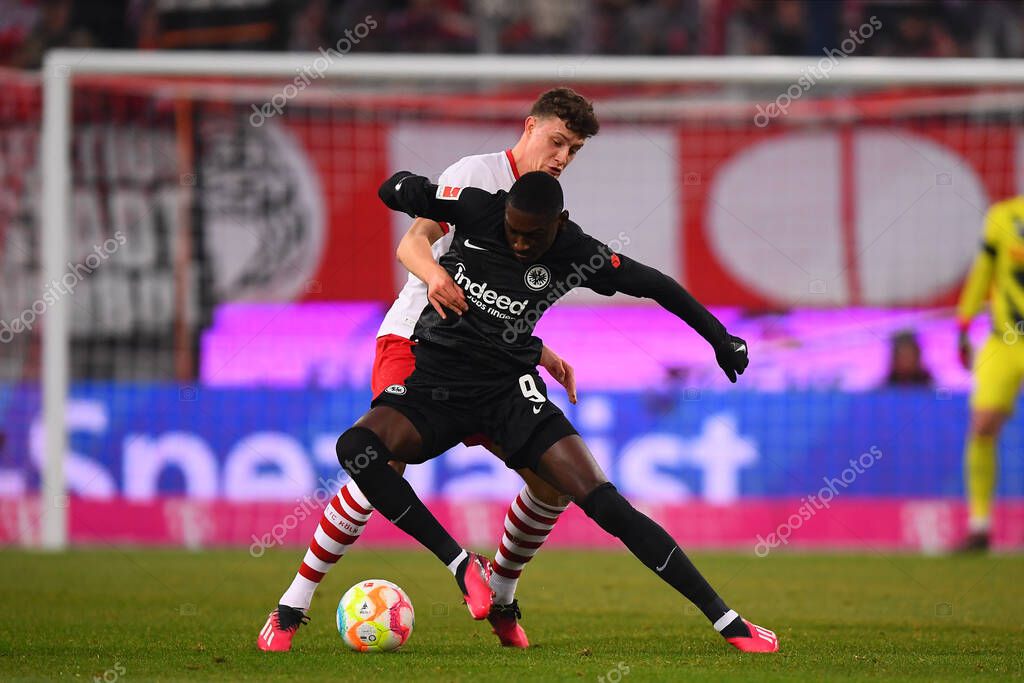 COLOGNE, GERMANY - 12.02.23: Randal Kolo Muani, Eric Martel. The match of 1. Bundesliga 1. FC Koeln vs Eintracht Frankfurt at Rhein Energie Stadium