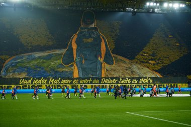 DORTMUND, GERMANY - 15.02.23: Fan performance. The match of match UEFA Champion League Borussia Dortmund vs FC Chelsea at SIGNAL IDUNA PARK