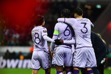 LEVERKUSEN, GERMANY - 16.02.23: Takumi Minamino, Axel Disasi, Guillermo Maripan. Celebrating goal.The match of match UEFA Europa League Bayer 04 Leverkusen vs AS Monaco FC at Bayarena