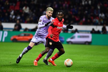 LEVERKUSEN, GERMANY - 16.02.23: Jeremie Frimpong vs Caio Henrique. The match of match UEFA Europa League Bayer 04 Leverkusen vs AS Monaco FC at Bayarena