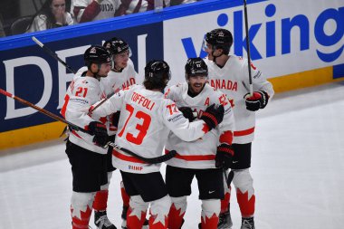LATVIA, RIGA - 12.05.23: gülüş Scott, GLASS Cody, QUINN Jack, WEEGER Mackenzie. Letonya-Kanada maçı. IIHF 2023 Buz Hokeyi Dünya Şampiyonası