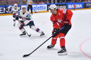 LATVIA, RIGA - 14.05.23: AMBUHL Andres. Norveç, İsviçre 'ye karşı. IIHF 2023 Buz Hokeyi Dünya Şampiyonası Arena Riga 'da
