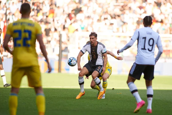 stock image BREMEN, GERMANY - 12 June, 2023: Leon Goretzka vs Mykhailo Mudryk , The friendly football match Germany - Ukraine at Weser Stadium