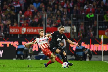 COLOGNE, ALMANY - 4 Kasım 2023: Florian Kainz, Fredrik Jensen, Bundesliga 1 'in futbol maçı. FC Koeln, FC Augsburg 'a karşı Rhein Enerji Stadyumu' nda