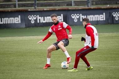 COLOGNE, GERMANY - 24 HAZİRAN, 2024: Leart Paqarada, Dejan Ljubicic, Practice 1. FC Koeln, Geissbockheim 'da.