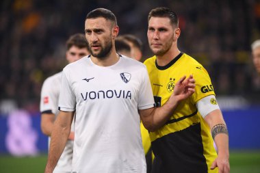DORTMUND, GERMANY - 28 JANUARY, 2024: İvan Ordets, Niklas Suele, Bundesliga Borussia Dortmund, Signal Iduna Park 'ta Bochum' a karşı