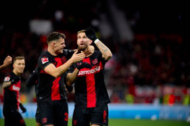 LEVERKUSEN, GERMANY - 23 Şubat 2024: Robert Andrich, Granit Xhaka, Bundesliga maçı Bayer 04 Leverkusen 'e karşı 1. Bayarena 'da FSV Mainz 05