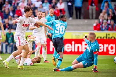 COLOGNE, ALMANY - 3 Mart 2024: Jeremie Frimpong Bundesliga 1 'in futbol maçı sırasında. FC Koeln, Bayer 04 Leverkusen 'e karşı Rhein Enerji Stadyumu' nda