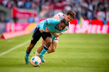 COLOGNE, ALMANY - 3 Mart 2024: Jeremie Frimpong Bundesliga 1 'in futbol maçı sırasında. FC Koeln, Bayer 04 Leverkusen 'e karşı Rhein Enerji Stadyumu' nda