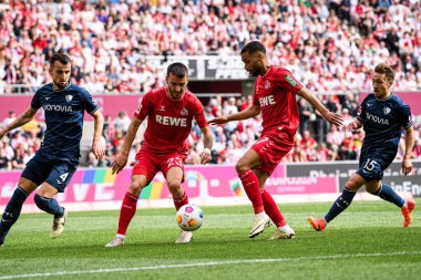 COLOGNE, GERMANY - 6 Nisan 2024: Erhan Masoviç, Sargis Adamyan, Linton Maina, Felix Passlack, Bundesliga 1 futbol karşılaşması. FC Koeln, VfL Bochum 1848 'e karşı Rhein Enerji Stadyumu' nda.
