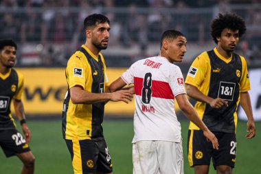 DORTMUND, GERMANY - 6 APRIL, 2024: Emre Can, Enzo Millot, Karim Adeyemi, Bundesliga Borussia Dortmundh - Stuttgart maçı Signal Iduna Park