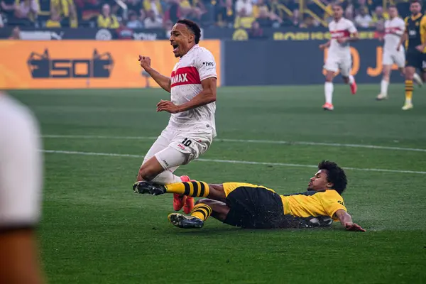 stock image DORTMUND, GERMANY - 6 APRIL, 2024: Jamie Leweling, Karim Adeyemi, The football match of Bundesliga Borussia Dortmundh vs Stuttgart at Signal Iduna Park