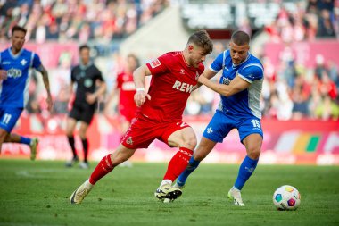 COLOGNE, GERMANY - 20 Nisan 2024: Jan Thielmann, Fabian Nuernberger, 1.FC Koeln-SV Darmstadt maçı Rhein Energie Stadion 'da