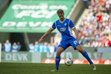 COLOGNE, GERMANY - 20 Nisan 2024: Oscar Vilhelmsson, Rhein Energie Stadion 'da 1.FC Koeln - SV Darmstadt maçı