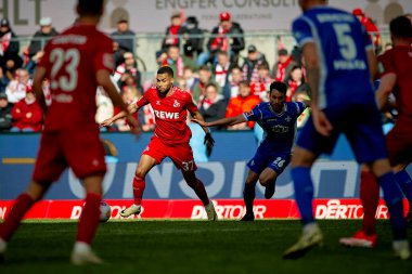 COLOGNE, GERMANY - 20 Nisan 2024: Linton Maina, Rhein Energie Stadion 'da 1.FC Koeln-SV Darmstadt maçı