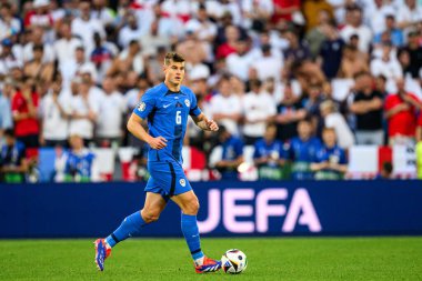 COLOGNE, GERMANY - 25 JUNE, 2024: Jaka Bijol, The football match of EURO 2024 England vs Slovenia at Cologne Stadion clipart