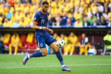 MUNICH, Almanya - 2 Temmuz 2024: Cody Gakpo, EURO 2024 Romanya ve Hollanda 'nın Alianz' da oynadığı futbol maçı