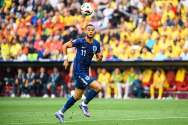MUNICH, Almanya - 2 Temmuz 2024: Cody Gakpo, EURO 2024 Romanya ve Hollanda 'nın Alianz' da oynadığı futbol maçı