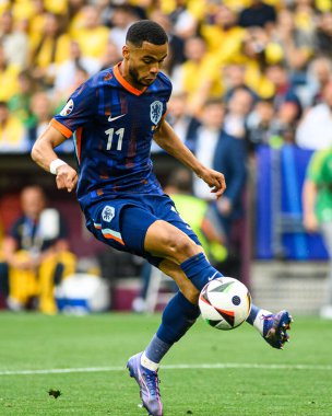 MUNICH, Almanya - 2 Temmuz 2024: Cody Gakpo, EURO 2024 Romanya ve Hollanda 'nın Alianz' da oynadığı futbol maçı