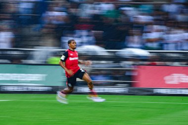 MOENCHENGLADBACH, GERMANY - 23 AUGUST, 2024: Alex Grimaldo, Florian Wirtz, Jonas Hofmann, The football match of Bundesliga Borussia Moenchengladbach vs Bayer Leverkusen  at Borussia Park clipart