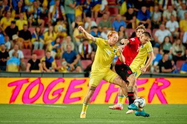 PRAGUE, CZECH REPUBLIC - 7 SEPTEMBER, 2024: Yukhym Konoplia, Rey Manaj, The match of UEFA Nations League Ukraine - Albania at Epet Arena clipart