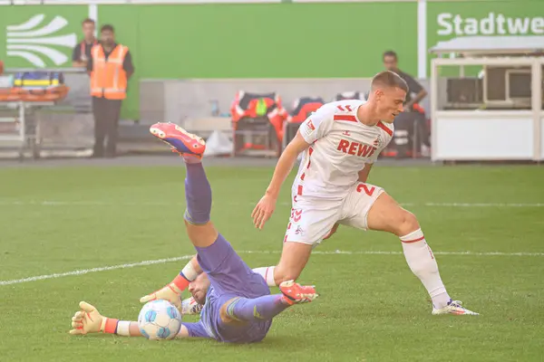 stock image DUESSELDORF, GERMANY - 21 SEPTEMBER, 2024: Steffen Tigges, Florian Kastenmeier, The football match of 2.Bundesliga Fortuna Duesseldorf vs. 1.FC Koeln at Mercur Spiel Arena