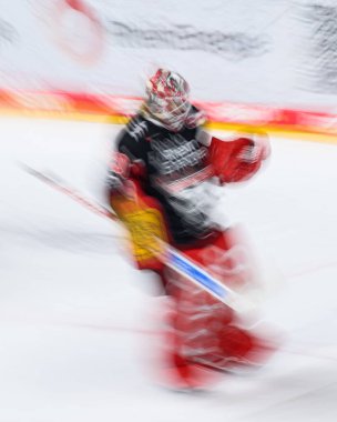 COLOGNE, GERMANY - 27 SEPTEMBER, 2024: The game of DEL Koelner Haie vs. Nurnberg Ice Tigers at Lanxess Arena clipart