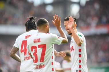 COLOGNE, GERMANY - 29 SEPTEMBER, 2024: Leart Paqarada, Linton Maina, Damion Downs, 2.Bundesliga 1.FC Koeln-Karlsruher SC maçı Rhein Energie Stadion 'da