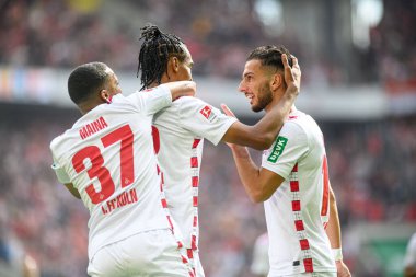 COLOGNE, GERMANY - 29 SEPTEMBER, 2024: Leart Paqarada, Linton Maina, Damion Downs, 2.Bundesliga 1.FC Koeln-Karlsruher SC maçı Rhein Energie Stadion 'da