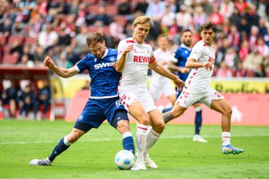 COLOGNE, GERMANY - 29 SEPTEMBER, 2024: Budu Zivzivadze, Timo Huebers, 2.Bundesliga 1.FC Koeln-Karlsruher SC maçı Rhein Energie Stadion 'da