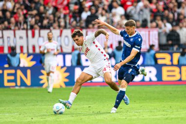 COLOGNE, GERMANY - 29 SEPTEMBER, 2024: Julian Pauli, Andrin Hunziker, 1.Bundesliga 1.FC Koeln-Karlsruher SC maçı Rhein Energie Stadion 'da