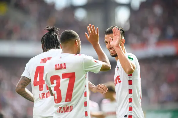 stock image COLOGNE, GERMANY - 29 SEPTEMBER, 2024: Leart Paqarada, Linton Maina, Damion Downs, The football match of 2.Bundesliga 1.FC Koeln vs Karlsruher SC at Rhein Energie Stadion