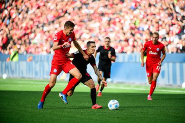 LEVERKUSEN, GERMANY - 5 OCTOBER, 2024: Alex Grimaldo, Bundesliga, matchday 2. The match Bayer 04 Leverkusen vs Holstein Kiel at BayArena clipart