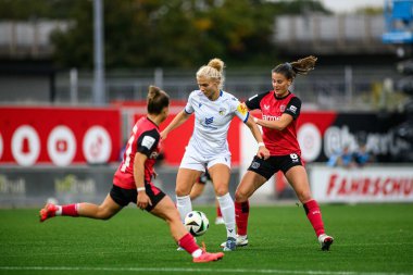 LEVERKUSEN, GERMANY - 7 OCTOBER, 2024: The match of Women Bundesliga Bayer 04 Leverkusen - FC Carl Zeiss Jena at Ulrich Haberland Stadion clipart