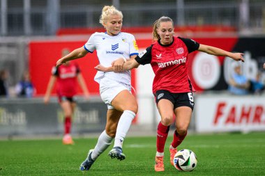 LEVERKUSEN, GERMANY - 7 OCTOBER, 2024: The match of Women Bundesliga Bayer 04 Leverkusen - FC Carl Zeiss Jena at Ulrich Haberland Stadion clipart