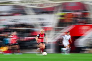 LEVERKUSEN, GERMANY - 10 NOVEMBER, 2024: The football match of Bundesliga Bayer 04 Leverkusen vs 1. FFC Turbine Potsdam at Ulrich Haberland Stadion clipart