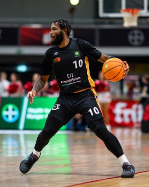 LEVERKUSEN, GERMANY - 10 NOVEMBER, 2024: Dawkins Uzziah, BARMER 2. Basketball Bundesliga. Basketball game Bayer Giants Leverkusen vs LOK Bernau at Ostermann Arena clipart