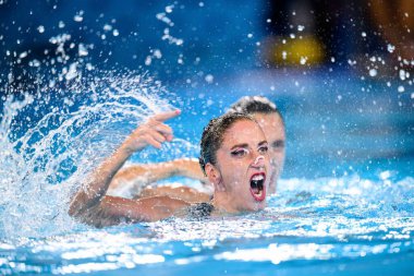 PARIS, FRANCE - 9 AUGust, 2024: ALEXANDRI Anna-Maria, ALEXANDRI Eirini-Marina, The Artistic Swimming, Duet, Technical Routine, Artistic Swimming, Duet, Technical Routine, Aquatics Centre 'da Paris 2024 Olimpiyat Oyunları